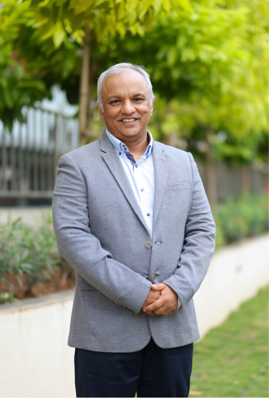 Dr. Samiran Ghosh standing outdoors